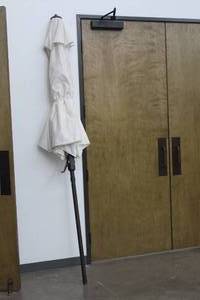lot 350 image: SAFAVIEH PATION UMBRELLA