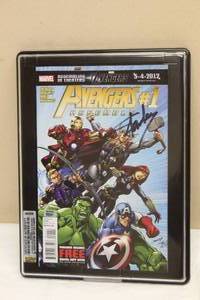 lot 4 image: MARVEL AVENGERS #1 COMIC BOOK SIGNED BY STAN LEE WITH COA AND SERIAL NUMBER