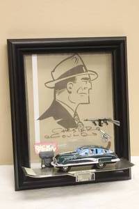 lot 26 image: MARK MY WORDS  CHESTER  GOULDS  SIGNED MEMORBILIA FAMOUS STRIP DRAWING , WITH DICK TRACY  LITO CLASSIC TIN RIOT SQUAD  CAR SIGNED JIM BROZMAN 2010  ,DICK TRACY SNUB NOSE & TOMMY-BURST