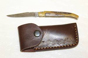lot 30 image: VINTAGE LAGUIOLE 246 POCKET KNIFE MADE IN FRANCE WITH LEATHER KNIFE CASE