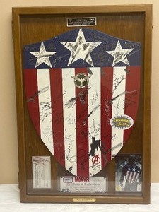 lot 7 image: 11 REPLICA 1940S WW2 SHEILD 4 OF 10 INSPIRED BY THE FIRST AVENGER SIGNED BY STAN LEE AND FRIENDS WITH COA AND SERIAL NUMBER