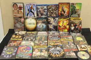 lot 242 image: LOT OF 25 WORLD WRESTLING ENTERTAINMENT OVER THE YEARS DVD LOT&nbsp