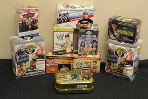 lot 243 image: GENEROUS AMOUNT OF WWEWWF TRADING CARDS INCLUDED SOME AUTHENTIC REPLICA CARDS ALL BOXES ARE OPENED