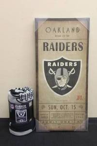 lot 18 image: OKLAND RAIDERS NFL TICKET WALL CANVAS 26X12 &amp OKLAND RAIDERS FLEECE THROW 50X60