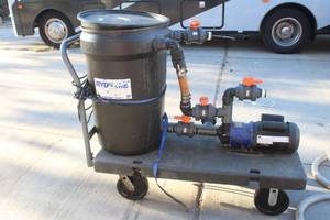 lot 46 image: HOMEMADE CIRCULATING PUMP WITH HOSES ON ULINE CART  SEE PICS&nbsp