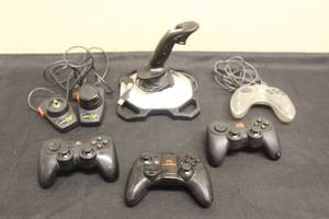 lot 68 image: TOTAL OF 6 GAME CONTROLLERS  SEE PICS&nbsp