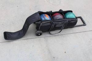 lot 22 image: 3 BOWLING BALLS&nbsp WITH STORM ROLLING BAG