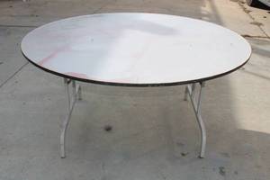 lot 23 image: 59 DIAM FOLDING TABLE