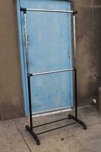 lot 26 image: ADJUSTABLE HEIGHT ROLLING CLOTHING RACK