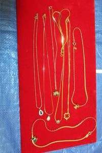 lot 110 image: LOT OF 7 GOLD NECKLACES WITH PENDANTS