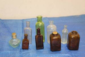 lot 102 image: LOT OF 9 VINTAGE ASSORTED MEDICINE BOTTLES&nbsp
