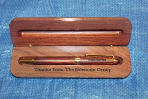 lot 95 image: THE NEWMAN GROUP WOOD PENIN WOOD CASE MONOGRAM (JEAN STEVENS)