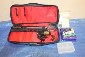 lot 96 image: OUTBACK MITCHELL 0B10 FISHING REELPOLE WITH ACCESSORIES AND CARRY CASE