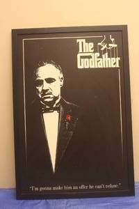 lot 137 image: THE GOD FATHER MOVIE WOOD POSTER IN WOOD FRAME&nbsp 38HX26