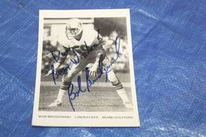 lot 140 image: MIAMI DOLPHINS BOB BRUDZIN SKI LINE BACKER SIGNED AUTOGRAPH&nbsp ,7X5