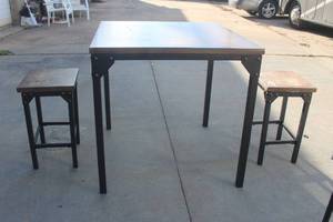 lot 203 image: COUNTER HEIGHT WOODEN&nbsp BAR DINING TABLE WITH 2- WOOD SEAT STOOLS&nbsp