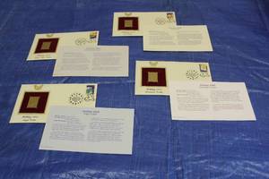 lot 234 image: TOTAL OF 4 FIRST DAY OF ISSUE OCTOBER 20,2005 HOLIDAY 2005 22KT GOLD REPLICA STAMPS&nbsp