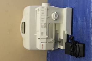 lot 237 image: SINGER SEWING MACHINE 5838C IN CASE&nbsp
