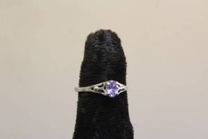 lot 249 image: STERLING SILVER RING WITH PUPLE STONE ,WT 1.7 GRAMS&nbsp