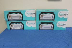 lot 39 image: TOTAL OF 4 HICCAPOP CONVERTIBLE CRIB SAFETY RAILS