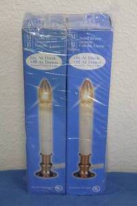 lot 81 image: TOTAL OF 2 MERRY BRITE SOLID BRASS SENSOR CANDLE LAMPS&nbsp