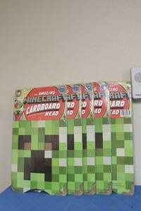 lot 104 image: TOTAL OF 5 JINX THE AMAZING MINECRAFT CARD BOARD HEADS , (MADE OF 100 % CARDBOARD )