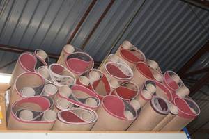 lot 227 image: GENEROUS AMOUNT OF LARGE SAND PAPER BELTS SEE PICS
